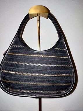 Coachtopia Ergo Bag with Upcrafted Zippers.